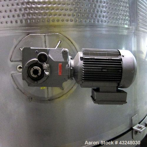 Used Mueller Tank, 6000 Gallon, Model DF, 304 Stainless Steel, Vertical. Approximate 118" diameter x 126" straight side. Off center coned top, sloped bottom. (1) 46” Section of dimple jacket on the s...