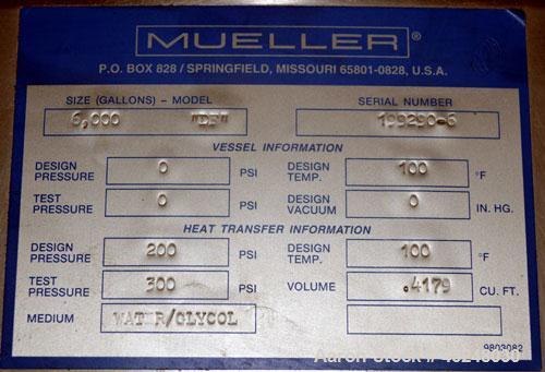 Used Mueller Tank, 6000 Gallon, Model DF, 304 Stainless Steel, Vertical. Approximate 118" diameter x 126" straight side. Off center coned top, sloped bottom. (1) 46” Section of dimple jacket on the s...