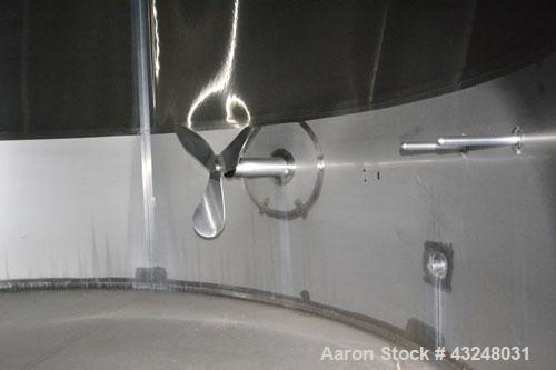 Used Mueller Tank, 6000 Gallon, Model DF, 304 Stainless Steel, Vertical. Approximate 118" diameter x 126" straight side. Off center coned top, sloped bottom. (1) 46” Section of dimple jacket on the s...