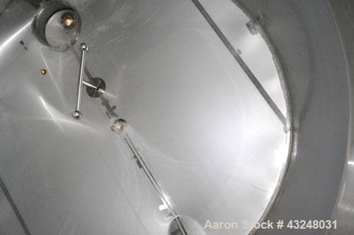 Used Mueller Tank, 6000 Gallon, Model DF, 304 Stainless Steel, Vertical. Approximate 118" diameter x 126" straight side. Off center coned top, sloped bottom. (1) 46” Section of dimple jacket on the s...