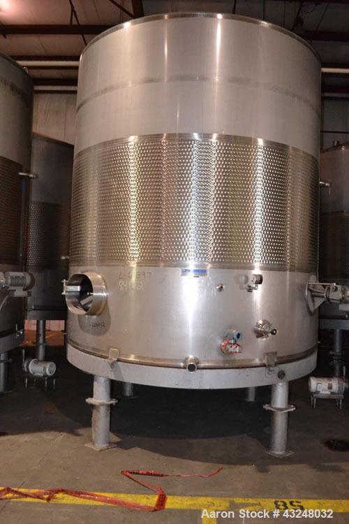 Used Mueller Tank, 6000 Gallon, Model DF, 304 Stainless Steel, Vertical. Approximate 118" diameter x 126" straight side. Off center coned top, sloped bottom. (1) 46” Section of dimple jacket on the s...