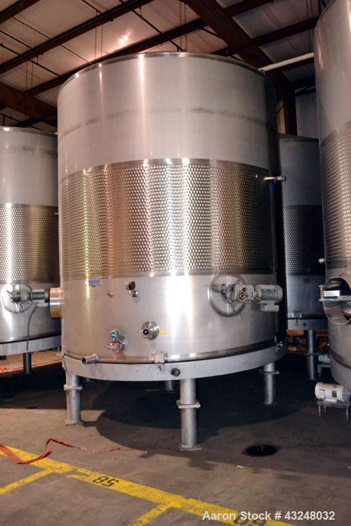 Used Mueller Tank, 6000 Gallon, Model DF, 304 Stainless Steel, Vertical. Approximate 118" diameter x 126" straight side. Off center coned top, sloped bottom. (1) 46” Section of dimple jacket on the s...