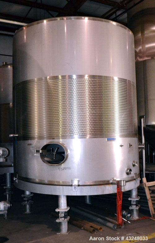 Used Mueller Tank, 6000 Gallon, Model DF, 304 Stainless Steel, Vertical. Approximate 118" diameter x 126" straight side. Off center coned top, sloped bottom. (1) 46” Section of dimple jacket on the s...