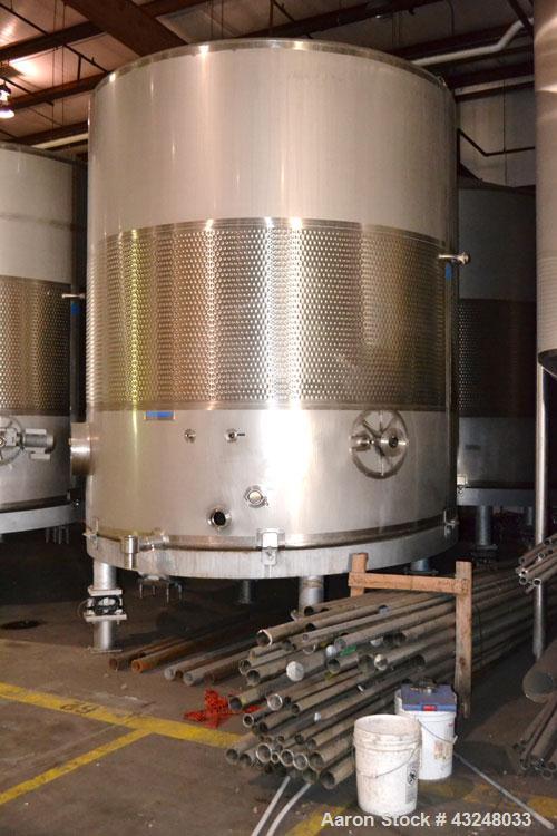 Used Mueller Tank, 6000 Gallon, Model DF, 304 Stainless Steel, Vertical. Approximate 118" diameter x 126" straight side. Off center coned top, sloped bottom. (1) 46” Section of dimple jacket on the s...