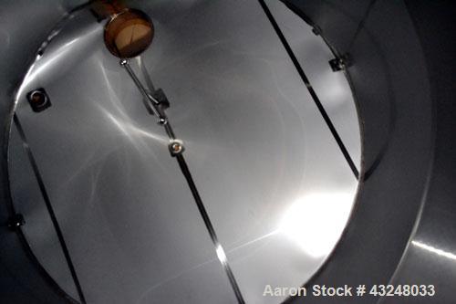 Used Mueller Tank, 6000 Gallon, Model DF, 304 Stainless Steel, Vertical. Approximate 118" diameter x 126" straight side. Off center coned top, sloped bottom. (1) 46” Section of dimple jacket on the s...