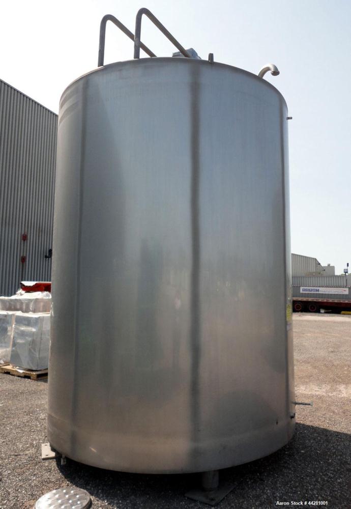 Used Mueller Storage Tank, 6,000 Gallon, Model D, 304 Stainless Steel, Vertical. 112” Diameter x approximate 135” straight side, dished top, 5” pitched sloped bottom. sidewall dimple jacket, approxim...