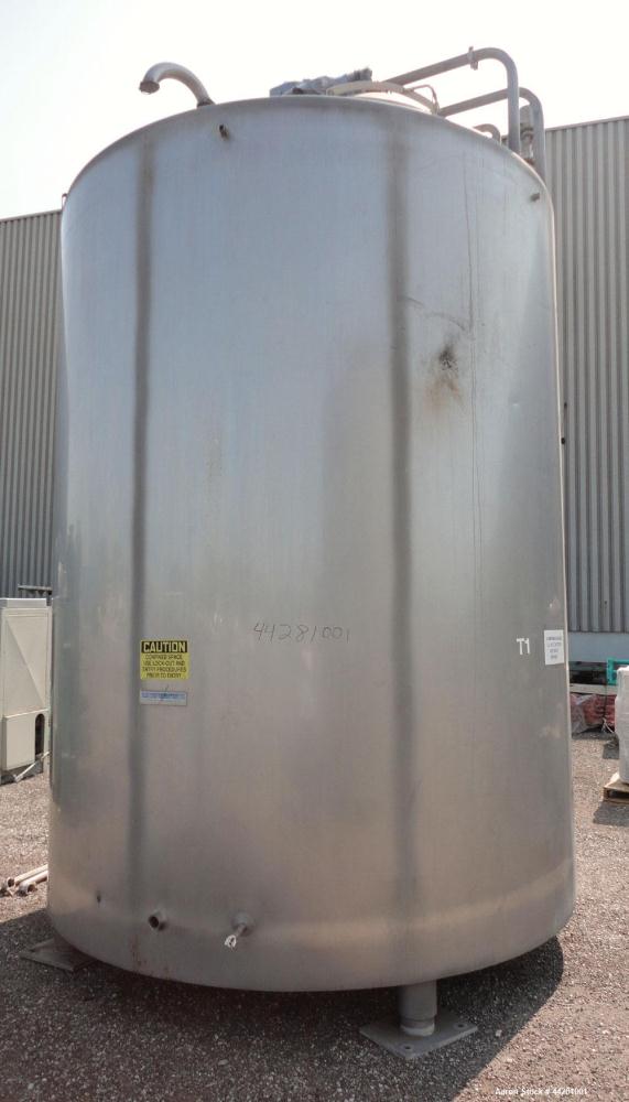 Used Mueller Storage Tank, 6,000 Gallon, Model D, 304 Stainless Steel, Vertical. 112” Diameter x approximate 135” straight side, dished top, 5” pitched sloped bottom. sidewall dimple jacket, approxim...