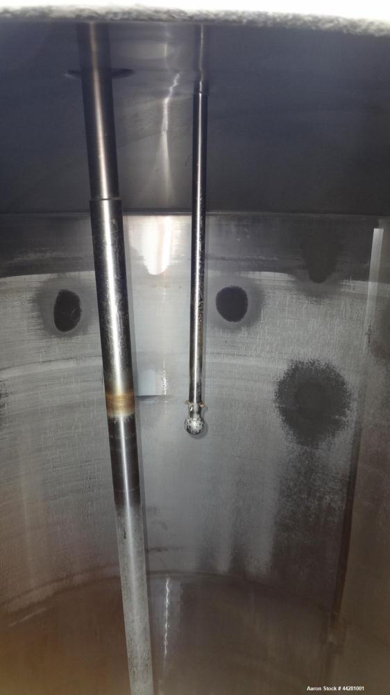 Used Mueller Storage Tank, 6,000 Gallon, Model D, 304 Stainless Steel, Vertical. 112” Diameter x approximate 135” straight side, dished top, 5” pitched sloped bottom. sidewall dimple jacket, approxim...