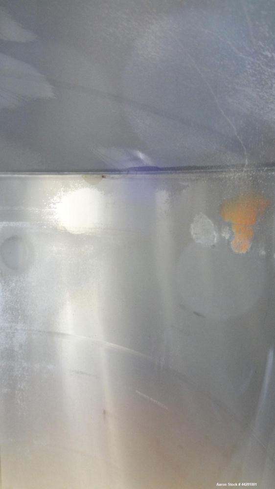 Used Mueller Storage Tank, 6,000 Gallon, Model D, 304 Stainless Steel, Vertical. 112” Diameter x approximate 135” straight side, dished top, 5” pitched sloped bottom. sidewall dimple jacket, approxim...