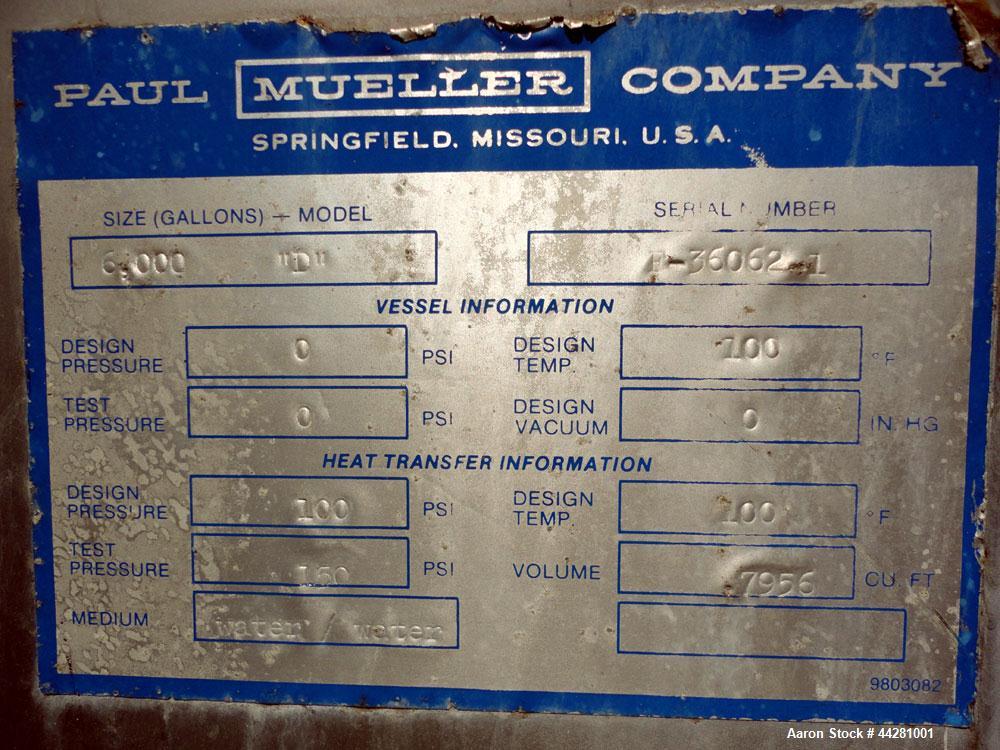 Used Mueller Storage Tank, 6,000 Gallon, Model D, 304 Stainless Steel, Vertical. 112” Diameter x approximate 135” straight side, dished top, 5” pitched sloped bottom. sidewall dimple jacket, approxim...