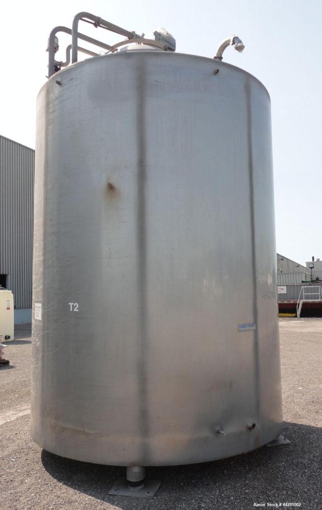 Used Mueller Storage Tank, 6,000 Gallon, Model D, 304 Stainless Steel, Vertical. 112” Diameter x approximate 135” straight side, dished top, 5” pitched sloped bottom. Sidewall dimple jacket, approxim...