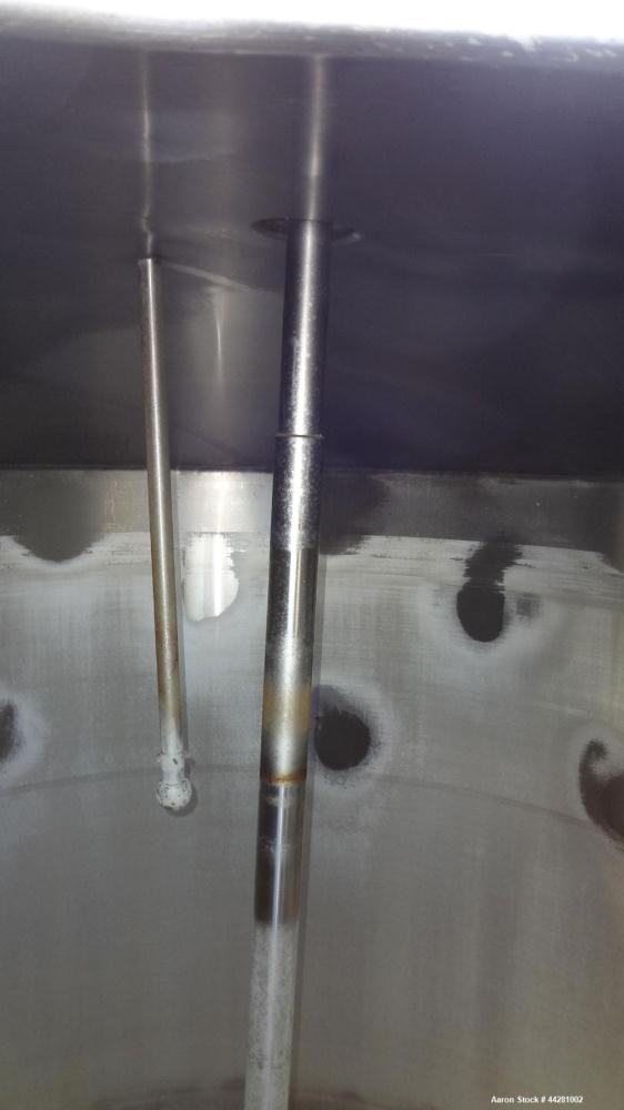 Used Mueller Storage Tank, 6,000 Gallon, Model D, 304 Stainless Steel, Vertical. 112” Diameter x approximate 135” straight side, dished top, 5” pitched sloped bottom. Sidewall dimple jacket, approxim...