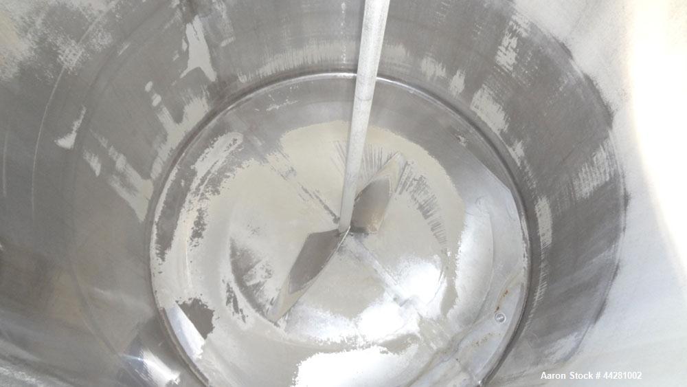Used Mueller Storage Tank, 6,000 Gallon, Model D, 304 Stainless Steel, Vertical. 112” Diameter x approximate 135” straight side, dished top, 5” pitched sloped bottom. Sidewall dimple jacket, approxim...
