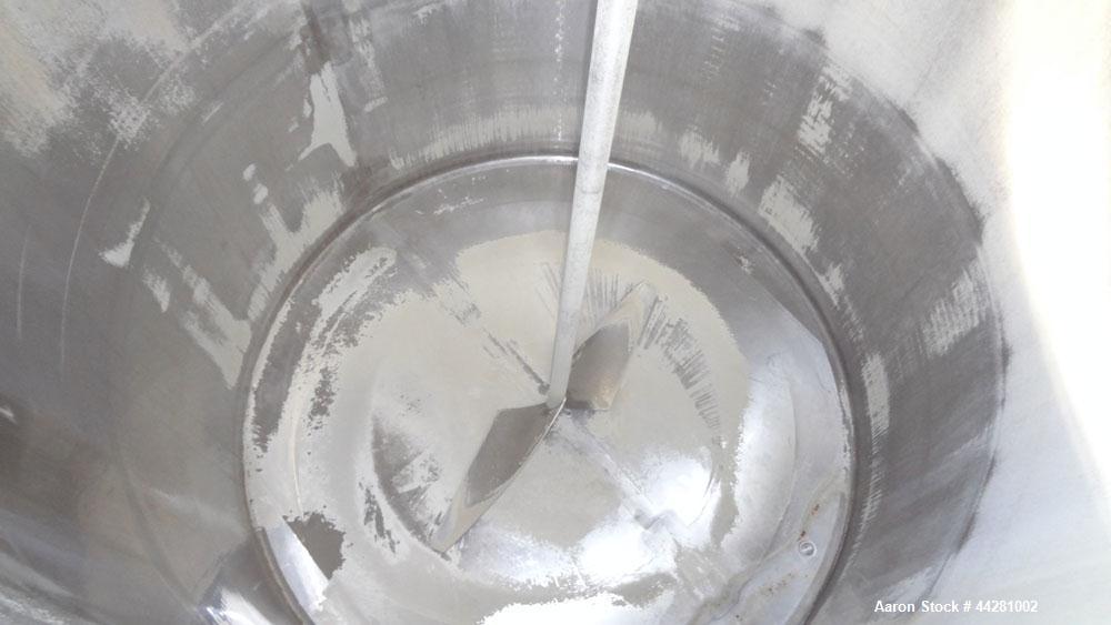 Used Mueller Storage Tank, 6,000 Gallon, Model D, 304 Stainless Steel, Vertical. 112” Diameter x approximate 135” straight side, dished top, 5” pitched sloped bottom. Sidewall dimple jacket, approxim...