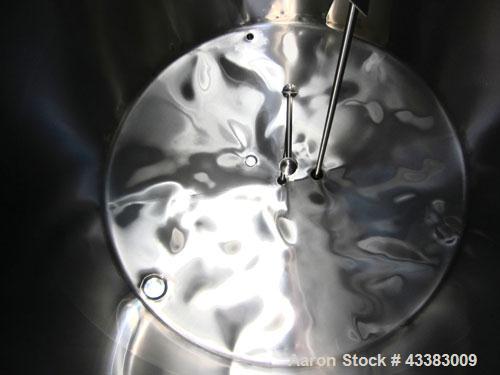 Used Mueller Tank, 5,000 Gallon, 304 Stainless Steel. Approximate 108” Diameter x approximate 125” straight side, dished top and bottom. 20 Cubic feet partial section of sidewall dimple jacket, cooli...
