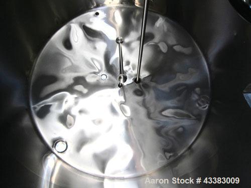Used Mueller Tank, 5,000 Gallon, 304 Stainless Steel. Approximate 108” Diameter x approximate 125” straight side, dished top and bottom. 20 Cubic feet partial section of sidewall dimple jacket, cooli...