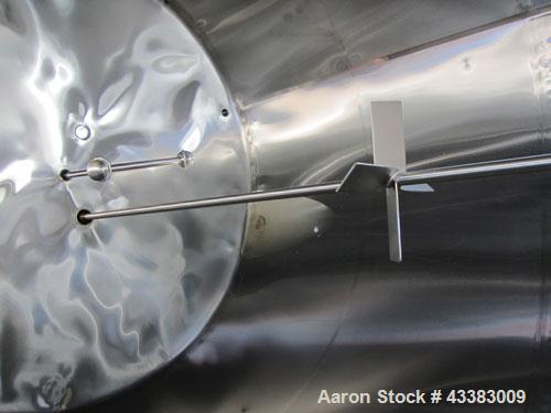 Used Mueller Tank, 5,000 Gallon, 304 Stainless Steel. Approximate 108” Diameter x approximate 125” straight side, dished top and bottom. 20 Cubic feet partial section of sidewall dimple jacket, cooli...