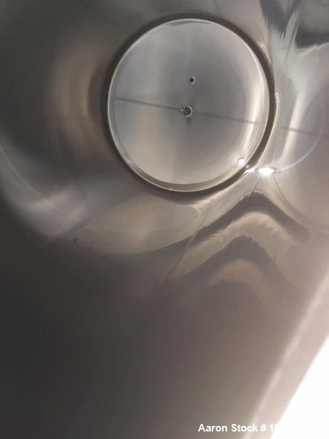 Used- Mueller 6000 Gallon Vertical 316 Stainless Steel Jacketed Tank. Sanitary polished, interior, 7'4" diameter x 20' strai...