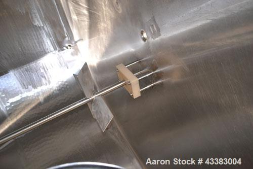 Used Mueller Tank, 5,000 Gallon, 304 Stainless Steel. Approximate 108” Diameter x approximate 125” straight side, dished top and bottom. Partial section of sidewall dimple jacket, no rating. Off cent...