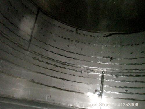 Used Winery Tank, 14,233 Gallon, 316 stainless steel, vertical. Approximately 156" diameter x 180" straight side, coned top, sloped bottom. Approximately 72" of sidewall bottom jacketed, no rating. O...