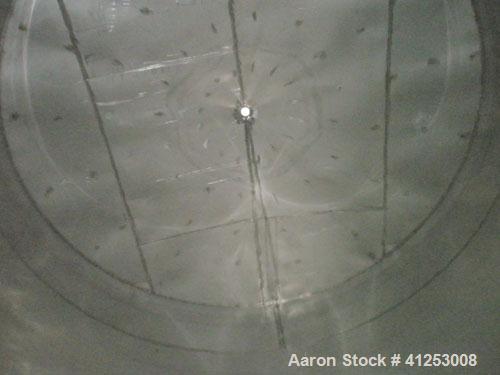 Used Winery Tank, 14,233 Gallon, 316 stainless steel, vertical. Approximately 156" diameter x 180" straight side, coned top, sloped bottom. Approximately 72" of sidewall bottom jacketed, no rating. O...