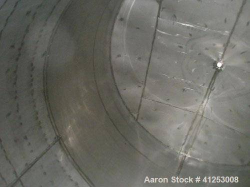 Used Winery Tank, 14,233 Gallon, 316 stainless steel, vertical. Approximately 156" diameter x 180" straight side, coned top, sloped bottom. Approximately 72" of sidewall bottom jacketed, no rating. O...