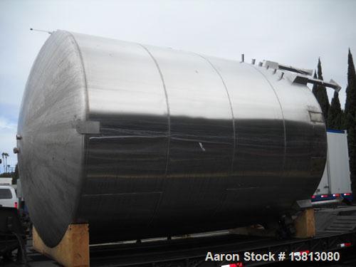 Used 14,000 Gallon Stainless Steel, Vertical Mixing Tank, Bottom Side Agitator, 23'L x 11'11" W x 13'5" Tall.