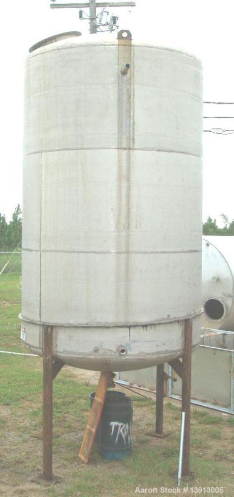 Used Tank, 5000 Gallon, 316 Stainless Steel, Vertical. Approximately 8' diameter x 18' tall, Dome top and dish bottom. Top manway. Center bottom outlet. Top lifting lugs. Mounted on 4 carbon steel le...