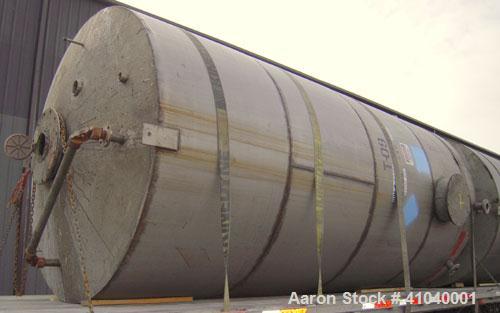 Used Tank, 6,000 Gallon, 304 Stainless Steel, Vertical.  Approximate 96" diameter x 192" straight side. Dish top, flat bottom.  Openings: top  20" bolt on manway with cover with 8" hinged door, 1/2" ...