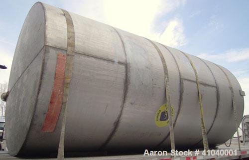Used Tank, 6,000 Gallon, 304 Stainless Steel, Vertical.  Approximate 96" diameter x 192" straight side. Dish top, flat bottom.  Openings: top  20" bolt on manway with cover with 8" hinged door, 1/2" ...
