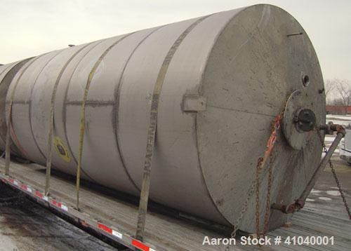 Used Tank, 6,000 Gallon, 304 Stainless Steel, Vertical.  Approximate 96" diameter x 192" straight side. Dish top, flat bottom.  Openings: top  20" bolt on manway with cover with 8" hinged door, 1/2" ...
