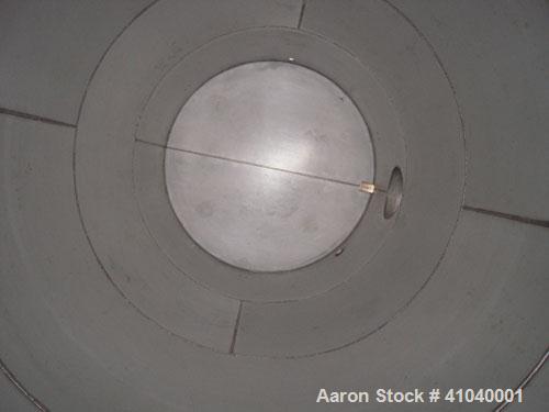 Used Tank, 6,000 Gallon, 304 Stainless Steel, Vertical.  Approximate 96" diameter x 192" straight side. Dish top, flat bottom.  Openings: top  20" bolt on manway with cover with 8" hinged door, 1/2" ...