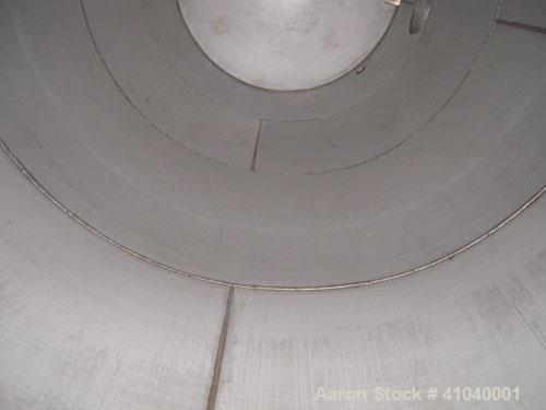 Used Tank, 6,000 Gallon, 304 Stainless Steel, Vertical.  Approximate 96" diameter x 192" straight side. Dish top, flat bottom.  Openings: top  20" bolt on manway with cover with 8" hinged door, 1/2" ...