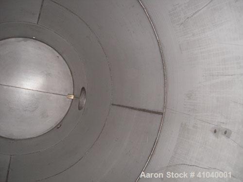 Used Tank, 6,000 Gallon, 304 Stainless Steel, Vertical.  Approximate 96" diameter x 192" straight side. Dish top, flat bottom.  Openings: top  20" bolt on manway with cover with 8" hinged door, 1/2" ...