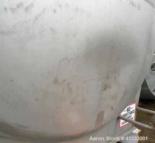 Used Florida Tank and Container Pressure Tank, 6000 gallon, 316L stainless steel, horizontal. 96" diameter x 180" straight side, dished heads. Internal rated 14.9 psi. Openings: top 20" manway with c...