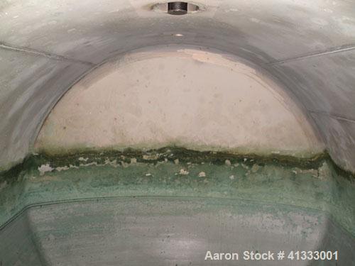 Used Florida Tank and Container Pressure Tank, 6000 gallon, 316L stainless steel, horizontal. 96" diameter x 180" straight side, dished heads. Internal rated 14.9 psi. Openings: top 20" manway with c...