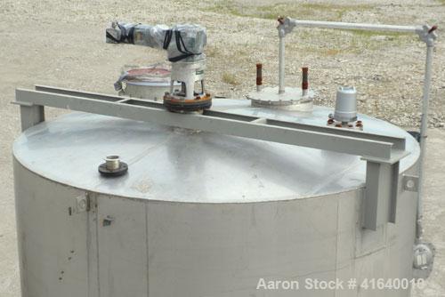 Used Bendel Tank, 5,000 Gallon, 304 Stainless Steel, Vertical. 118" diameter x 108" straight side, coned top, sloped bottom. UL rated for above ground flammable storage, UL#439373. Top mounted off ce...