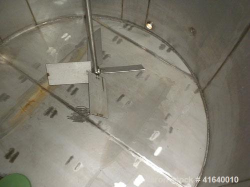 Used Bendel Tank, 5,000 Gallon, 304 Stainless Steel, Vertical. 118" diameter x 108" straight side, coned top, sloped bottom. UL rated for above ground flammable storage, UL#439373. Top mounted off ce...