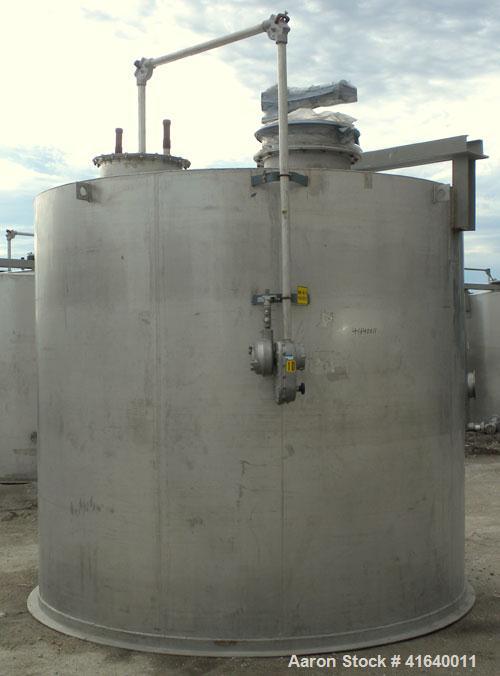 Used Bendel Tank, 5,000 Gallon, 304 Stainless Steel, Vertical. 118" diameter x 108" straight side, coned top, sloped bottom. UL rated for above ground flammable storage, UL#439372. Top mounted off ce...