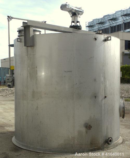 Used Bendel Tank, 5,000 Gallon, 304 Stainless Steel, Vertical. 118" diameter x 108" straight side, coned top, sloped bottom. UL rated for above ground flammable storage, UL#439372. Top mounted off ce...