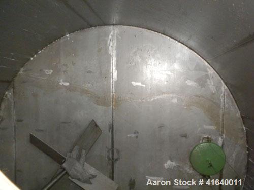 Used Bendel Tank, 5,000 Gallon, 304 Stainless Steel, Vertical. 118" diameter x 108" straight side, coned top, sloped bottom. UL rated for above ground flammable storage, UL#439372. Top mounted off ce...