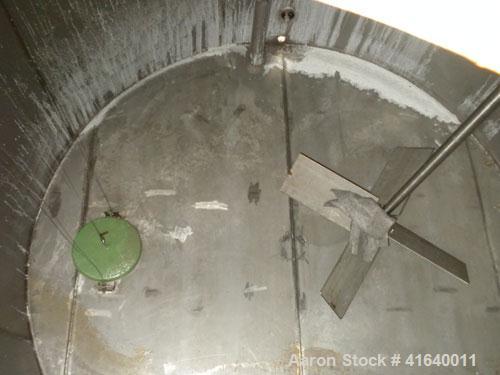 Used Bendel Tank, 5,000 Gallon, 304 Stainless Steel, Vertical. 118" diameter x 108" straight side, coned top, sloped bottom. UL rated for above ground flammable storage, UL#439372. Top mounted off ce...