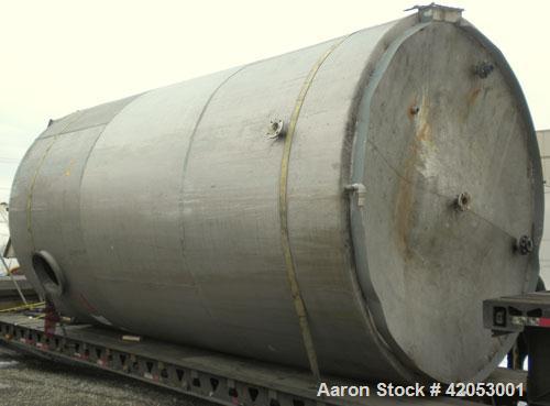 Used Tank, Approximate 17,000 Gallon, 316 Stainless Steel, Vertical. Approximate 144" diameter x 242" straight side, coned top (dented), sloped bottom. Top openings: (2) 3", 4", side 24" manway with ...