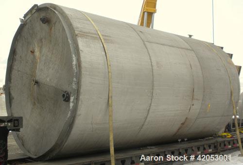 Used Tank, Approximate 17,000 Gallon, 316 Stainless Steel, Vertical. Approximate 144" diameter x 242" straight side, coned top (dented), sloped bottom. Top openings: (2) 3", 4", side 24" manway with ...