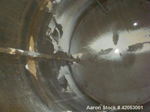 Used Tank, Approximate 17,000 Gallon, 316 Stainless Steel, Vertical. Approximate 144" diameter x 242" straight side, coned top (dented), sloped bottom. Top openings: (2) 3", 4", side 24" manway with ...