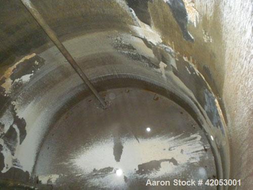 Used Tank, Approximate 17,000 Gallon, 316 Stainless Steel, Vertical. Approximate 144" diameter x 242" straight side, coned top (dented), sloped bottom. Top openings: (2) 3", 4", side 24" manway with ...