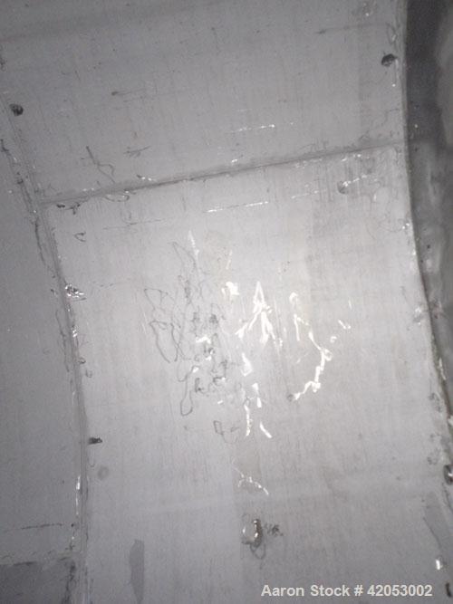 Used Tank, Approximate 17,000 Gallon, 316 Stainless Steel, Vertical. Approximate 144" diameter x 242" straight side, coned top (dented), sloped bottom. Top openings: (2) 3", 4", side 24" manway with ...