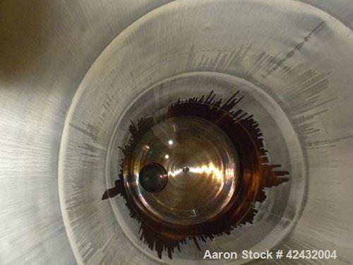 Used Tank, Approximately 5,000 Gallon / 19,220 Liter, 304 Stainless Steel, Vertical. 72" Diameter x 288" straight side, dish top and sloped bottom. Openings: top 18" manway with cover, 3" sanitary, (...