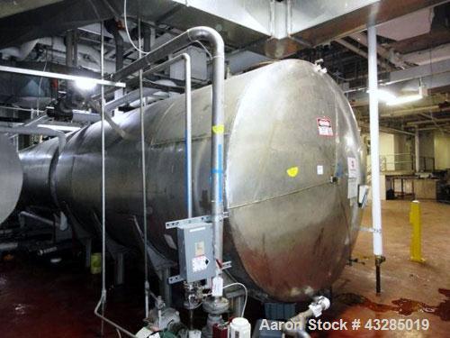 Used Tank, 6000 Gallon, Stainless Steel, Horizontal.Approximately 96" diameter x 180" straight side.Slight coned ends. Mounted on saddles.