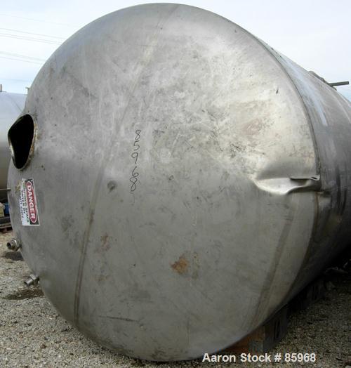 Used Tank, 5,000 Gallon, 304 Stainless Steel, Vertical. Approximate 102" diameter x 144" straight side. Dish top and bottom. Side bottom agitator, 3 blade prop, driven by a 5 HP, 3/60/230/460 Volt, 1...